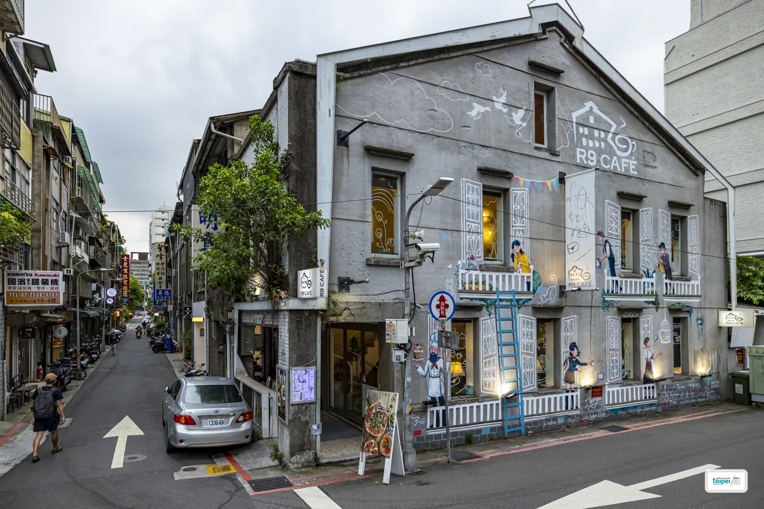 The hand-painted facade of R9 Café on a corner of Chifeng Street, Taipei