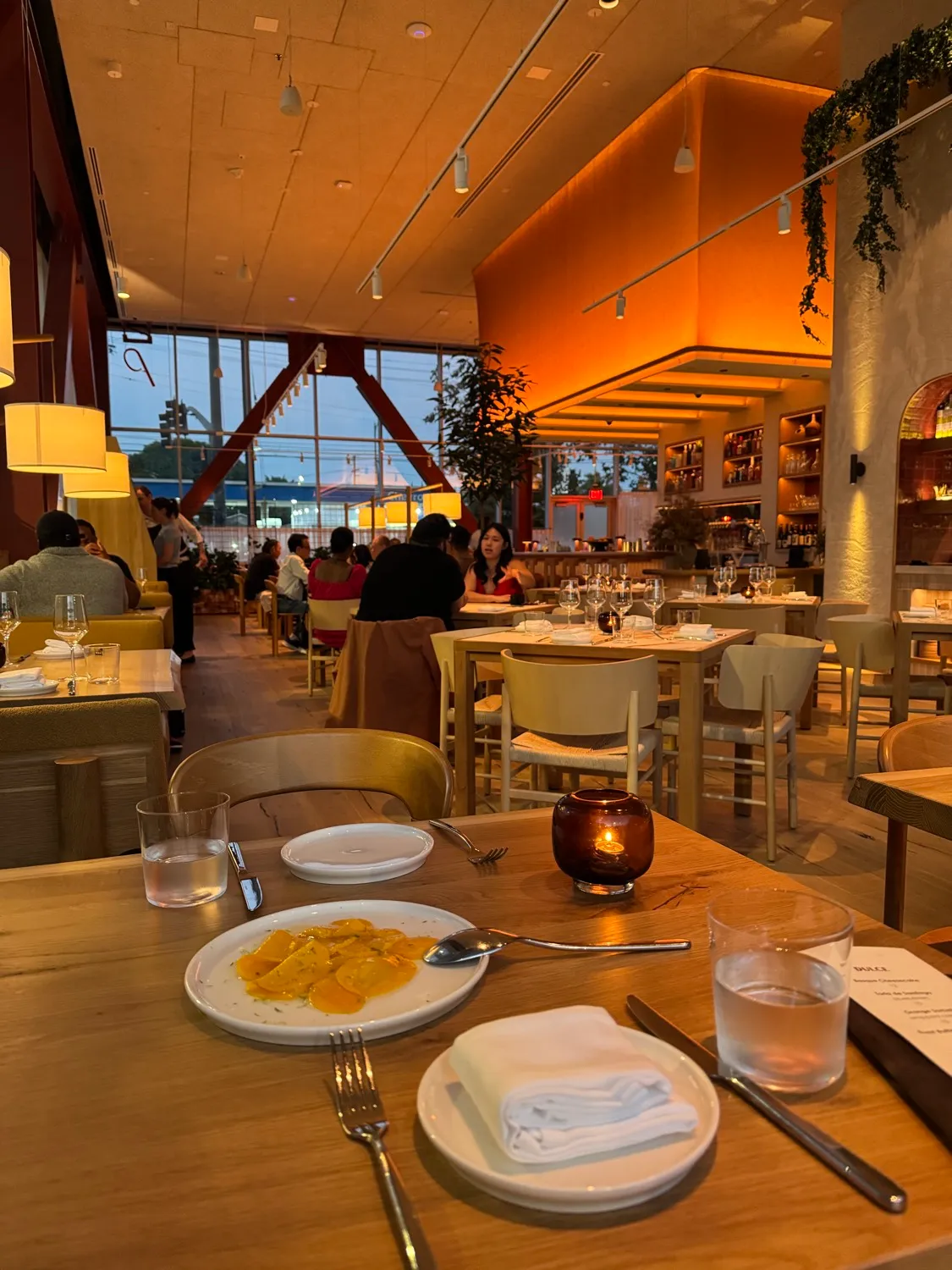 The shaved mango plate at Picala with the warm dining room behind it